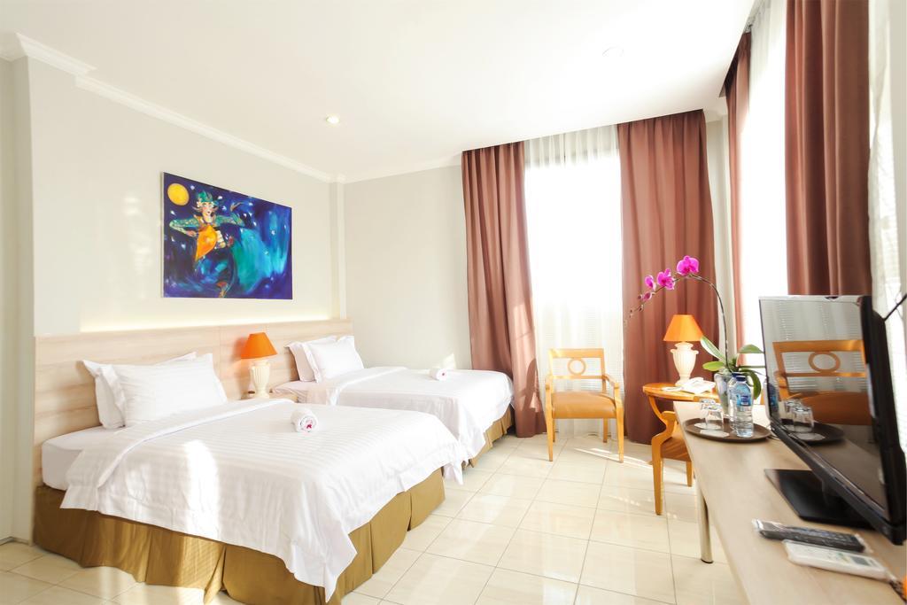 Chambre Deluxe Double ou Lits Jumeaux